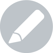 Picto rond gris clair avec un crayon blanc au centre, représentant la gravure manuelle sur verre