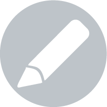 Picto rond gris clair avec un crayon blanc au centre, représentant la gravure manuelle sur verre